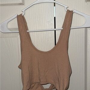 Cute tan colored cropped tank top
